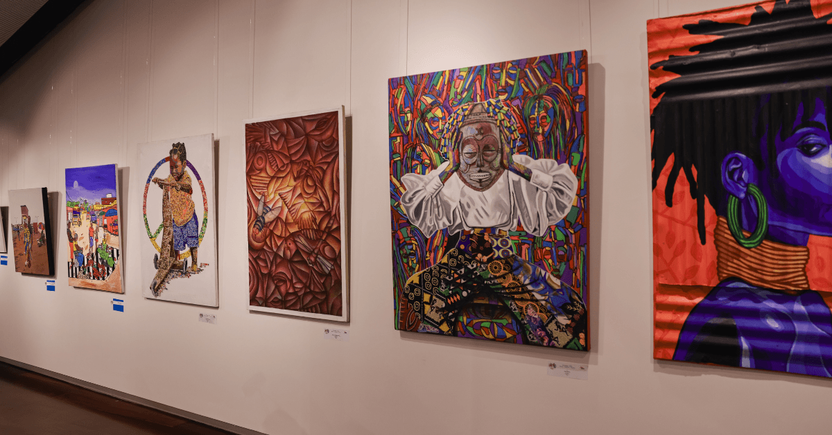 Interior of an Art Gallery displaying framed paintings 